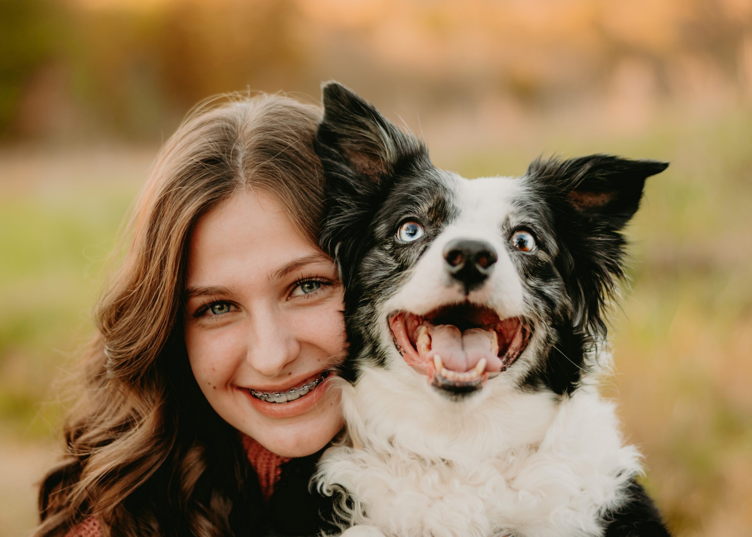 Collie and their owner smiling at the camera